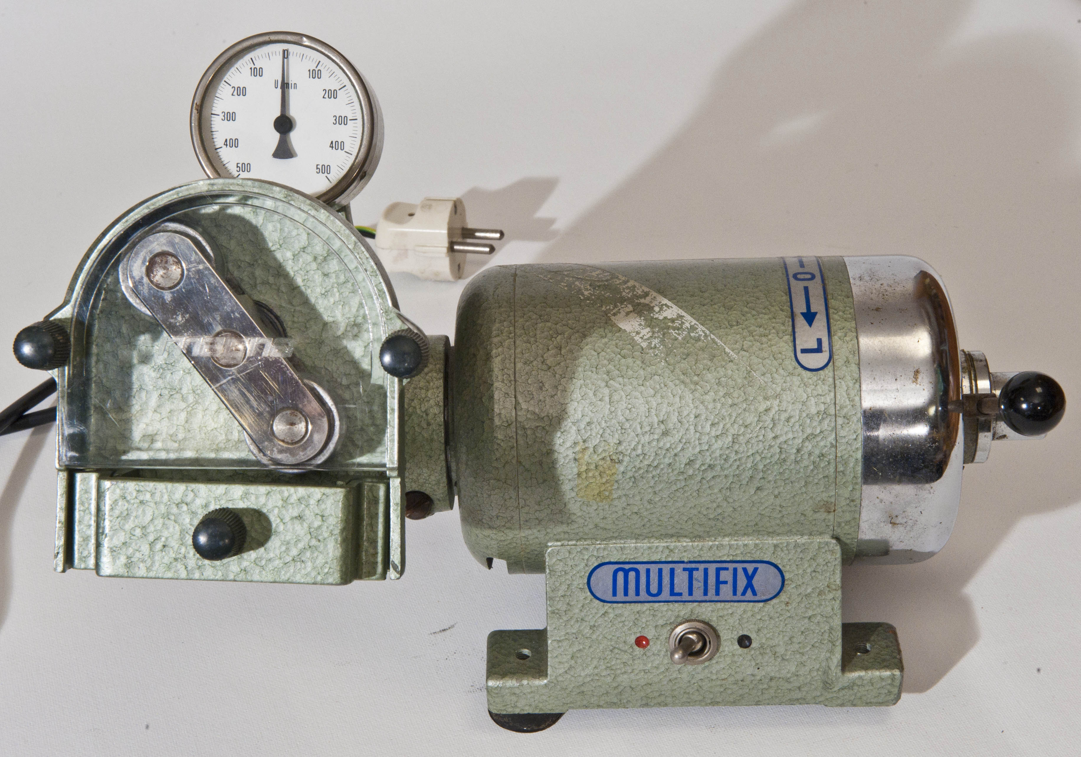 Peristaltic pump head close-up with speed scale