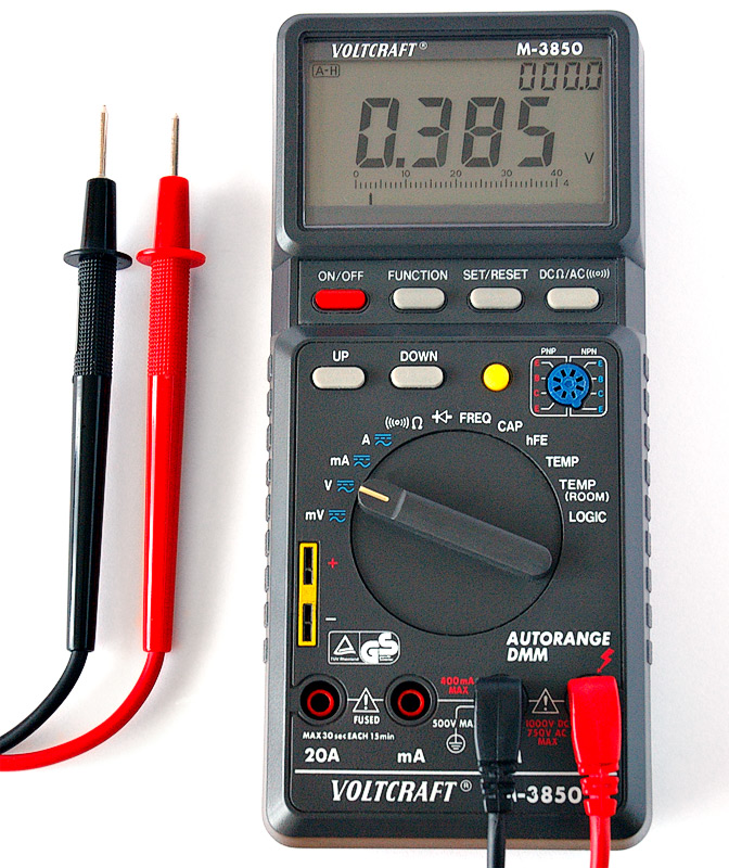 Digital multimeter used to check a soil sensor signal path before replacement